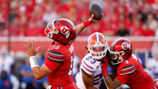 Aug 31, 2023; Salt Lake City, Utah, USA; Utah Utes quarterback Bryson Barnes (16) throws for a first half touchdown against the Florida Gators at Rice-Eccles Stadium. Mandatory Credit: Jeff Swinger-USA TODAY Sports